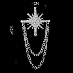 Snowflake & star brooch with diamonds and tassels.